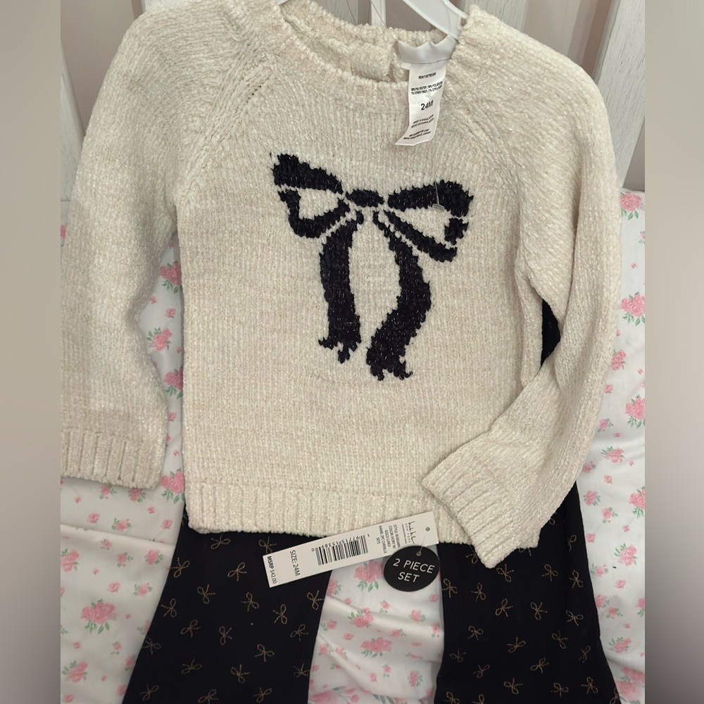 Nicole miller cream Sweater with Black Bow black flare pants